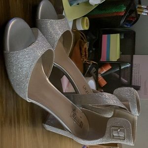 I’m selling these sliver high heels for women size 11